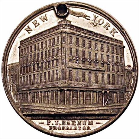 702  -  MILLER NY   59    AU P. T. Barnum New York Merchant Token