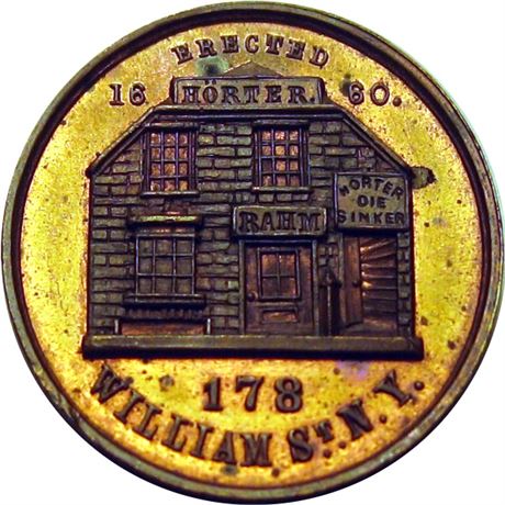 529  -  MILLER NY  652  Raw MS64  New York Merchant token