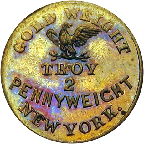 253  -  NY630AG-6b R7 Raw MS63 Brass Apothecary Weight New York Civil War token